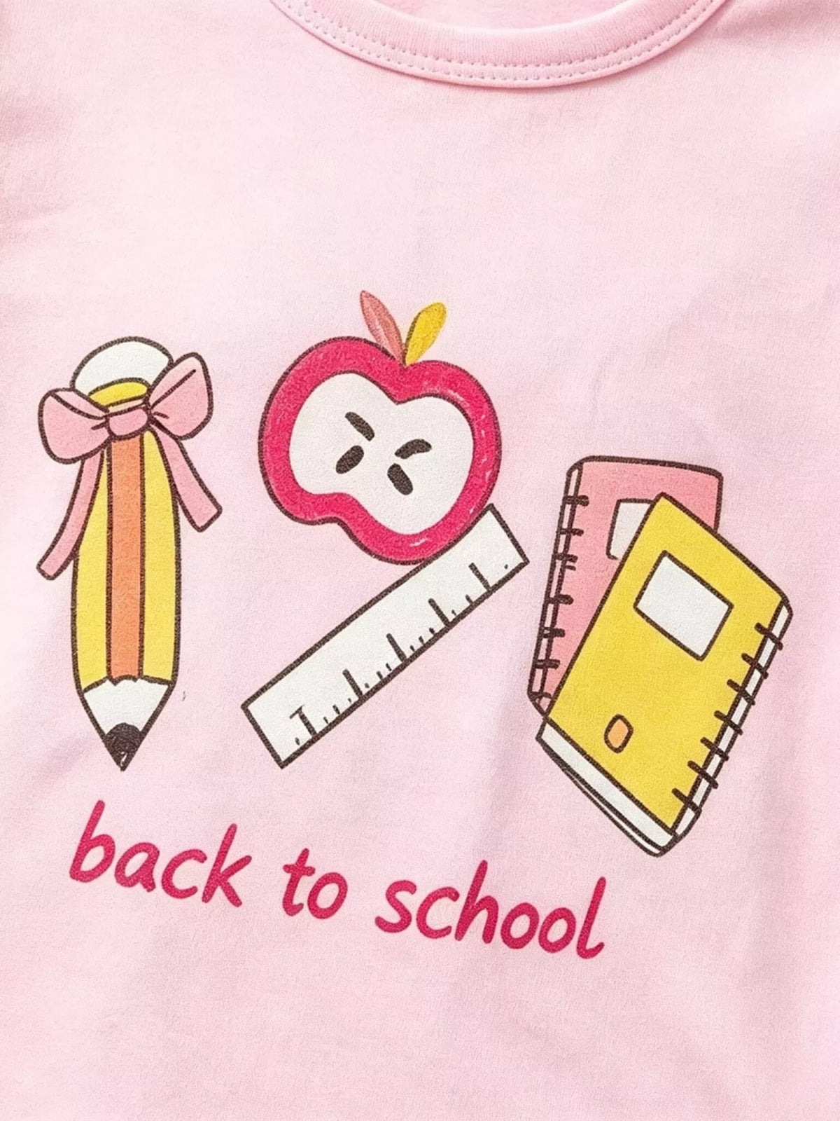 Pencil, apple, ruler and notebook with Back to School lettering