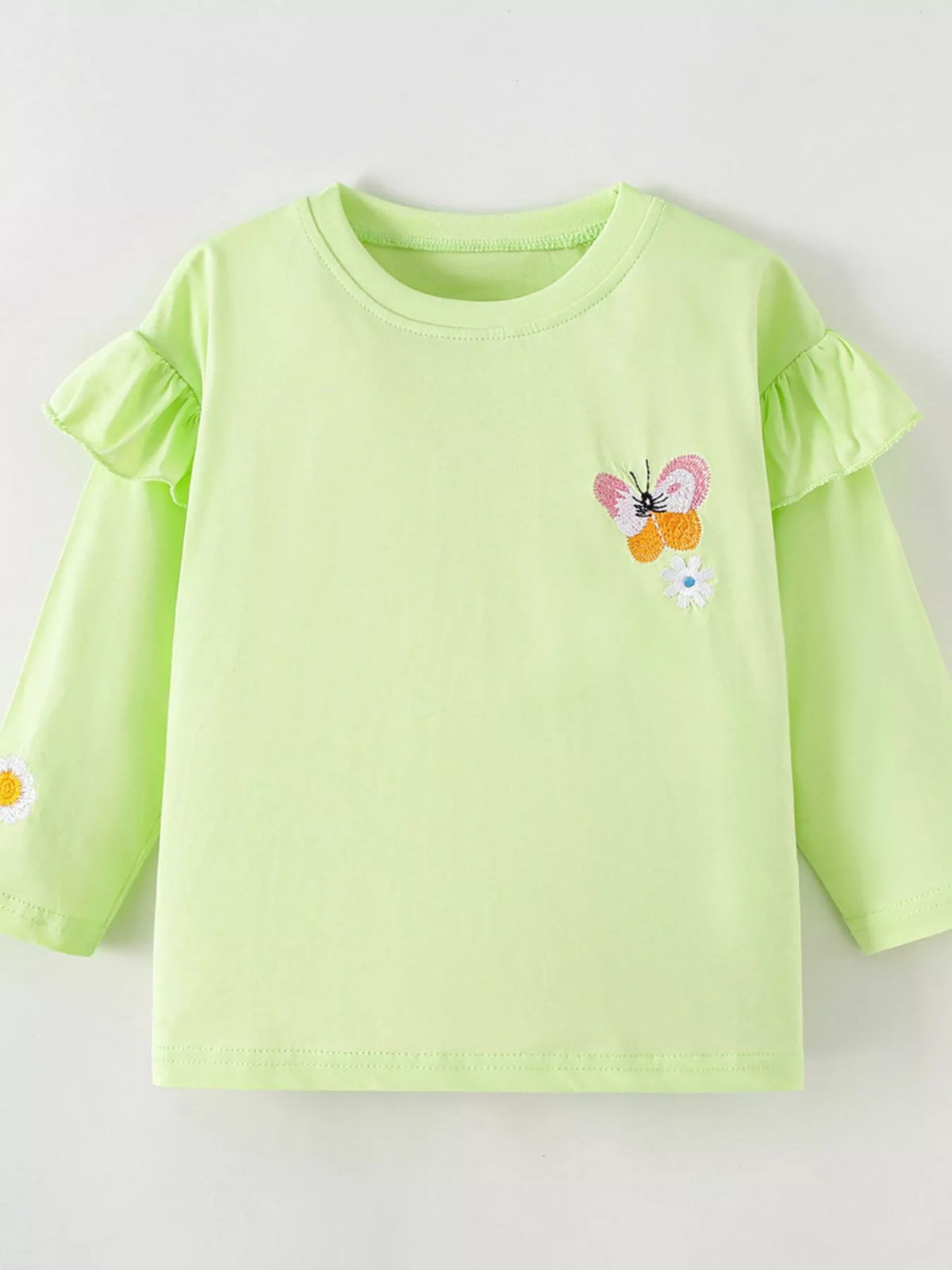 Lime green ruffle-shoulder long-sleeve butterfly top laid flat