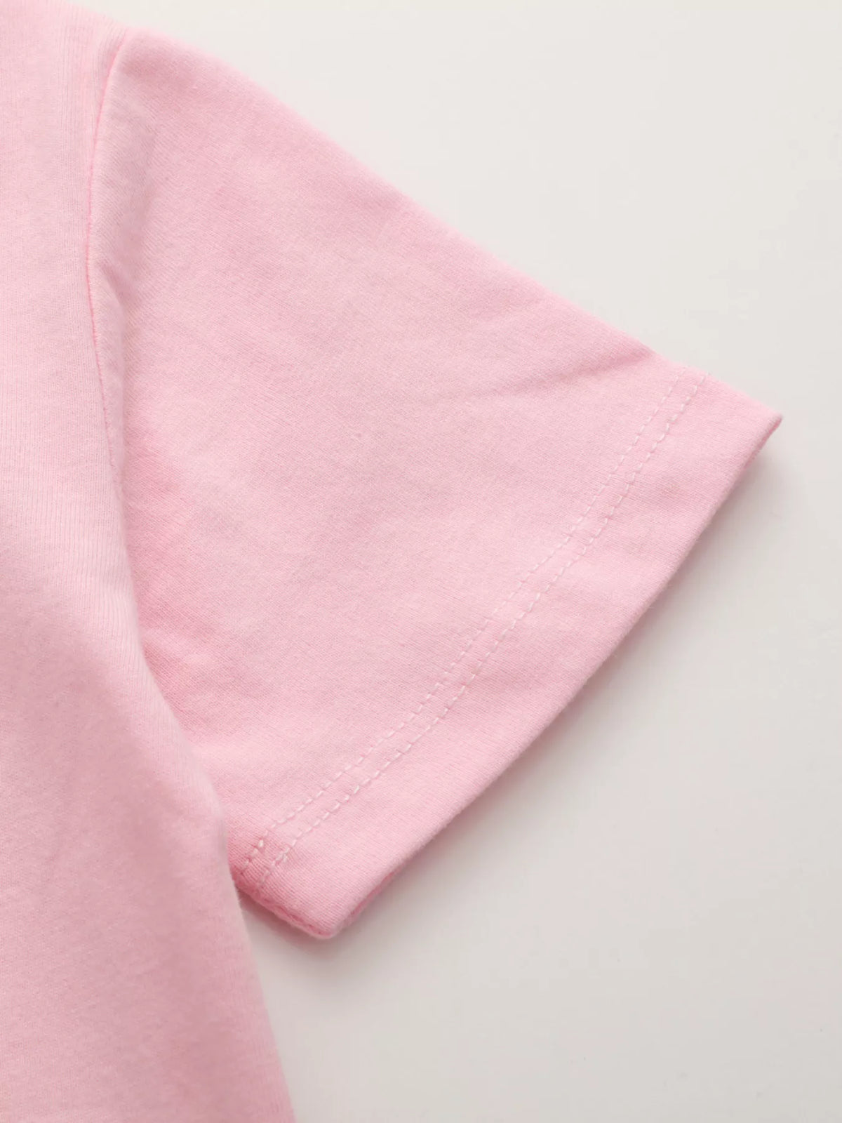 Pink winged unicorn graphic shirt — short sleeve