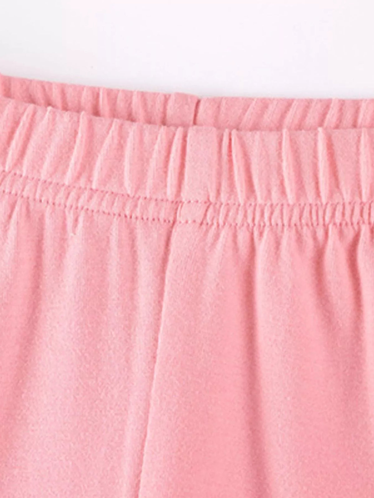 Elastic waistband on pink leggings