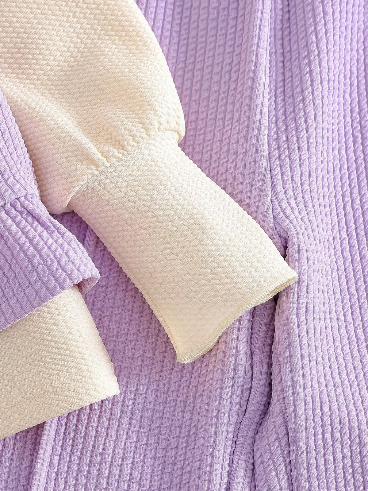 Cream ribbed sleeve cuff