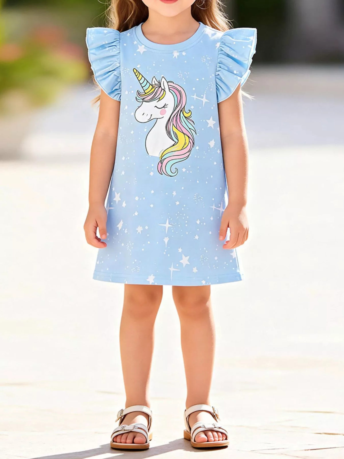Blue unicorn ruffle-sleeve dress with star motifs on a child