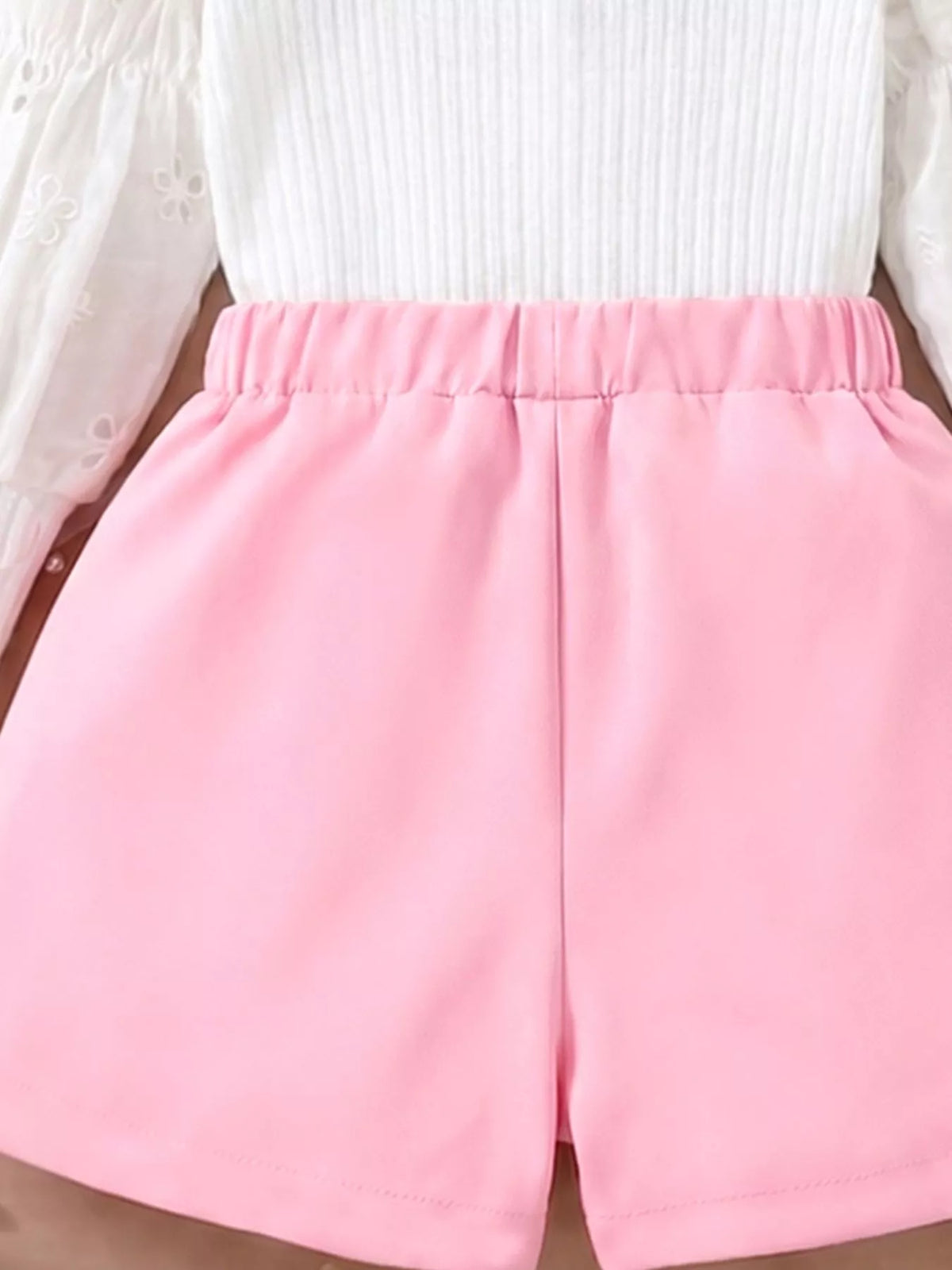 Elastic back waistband on pink shorts