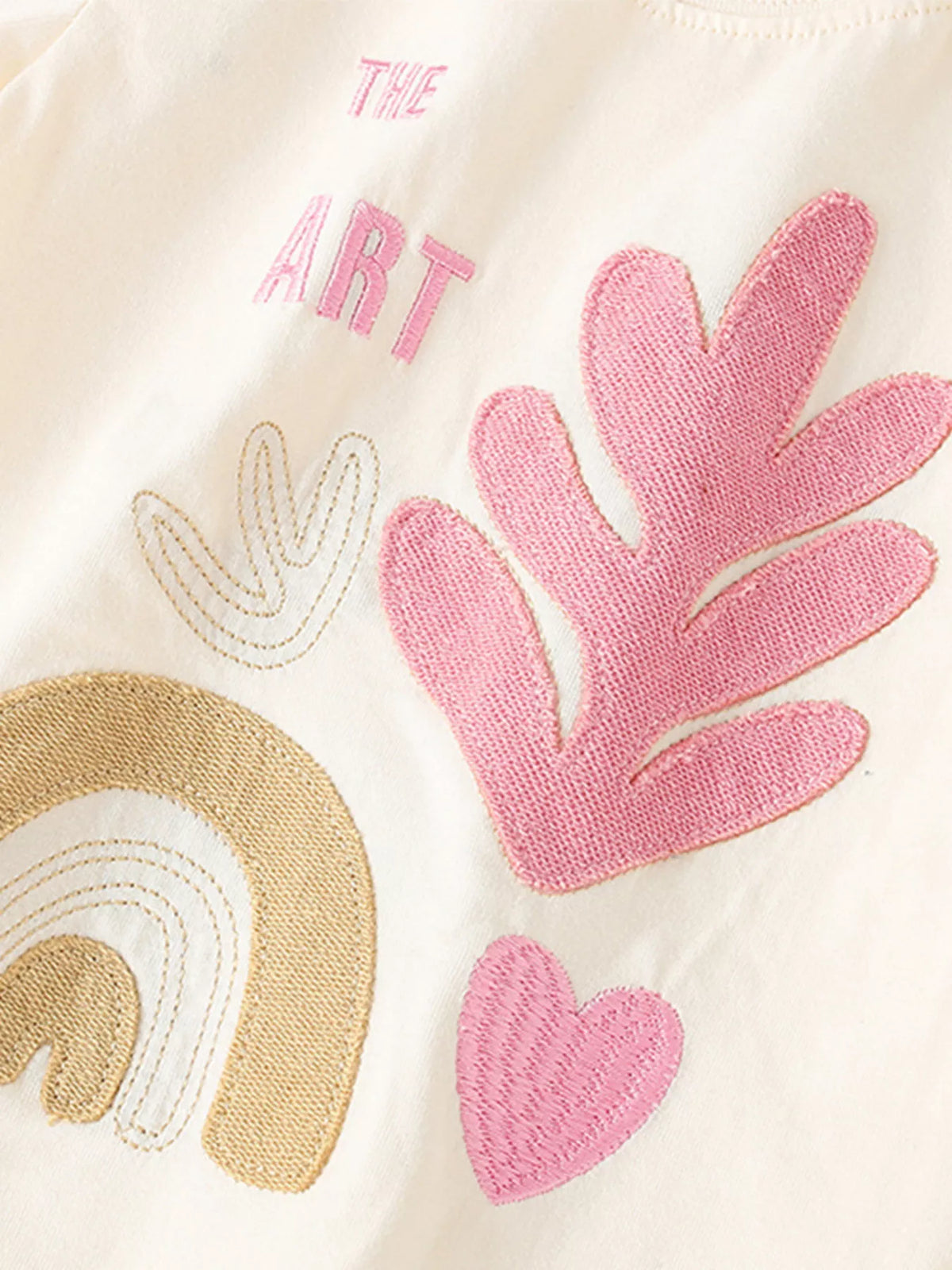 Cream abstract rainbow and leaf applique shirt — rainbow leaf and heart appliques