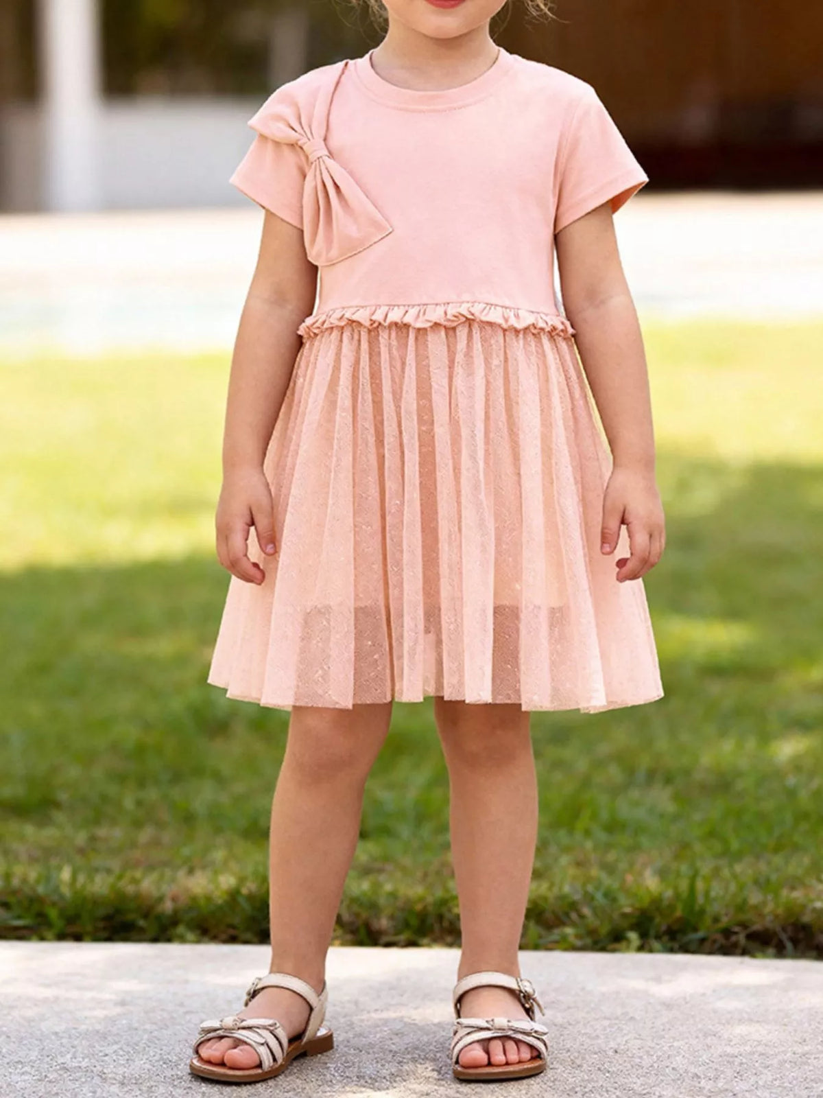 Pink Shoulder Bow Tulle Dress — dress worn by a child