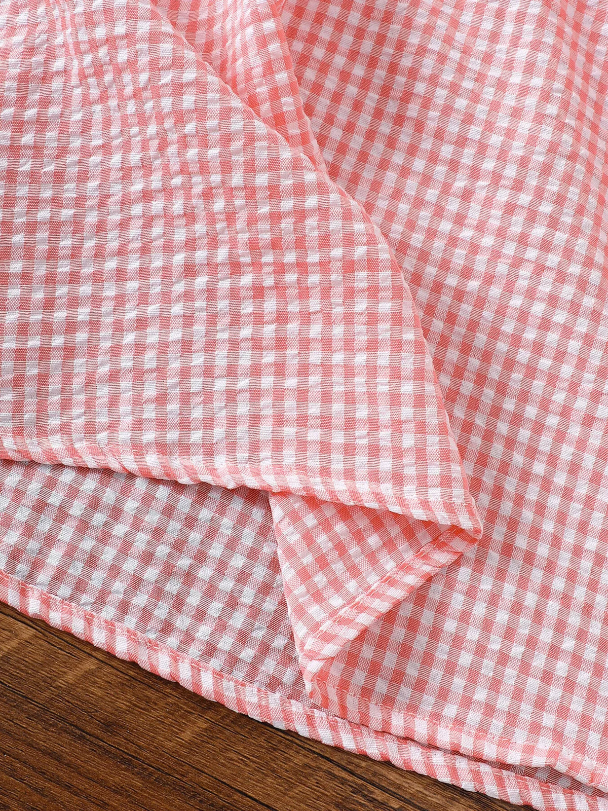 Inside stitching at the gingham hem