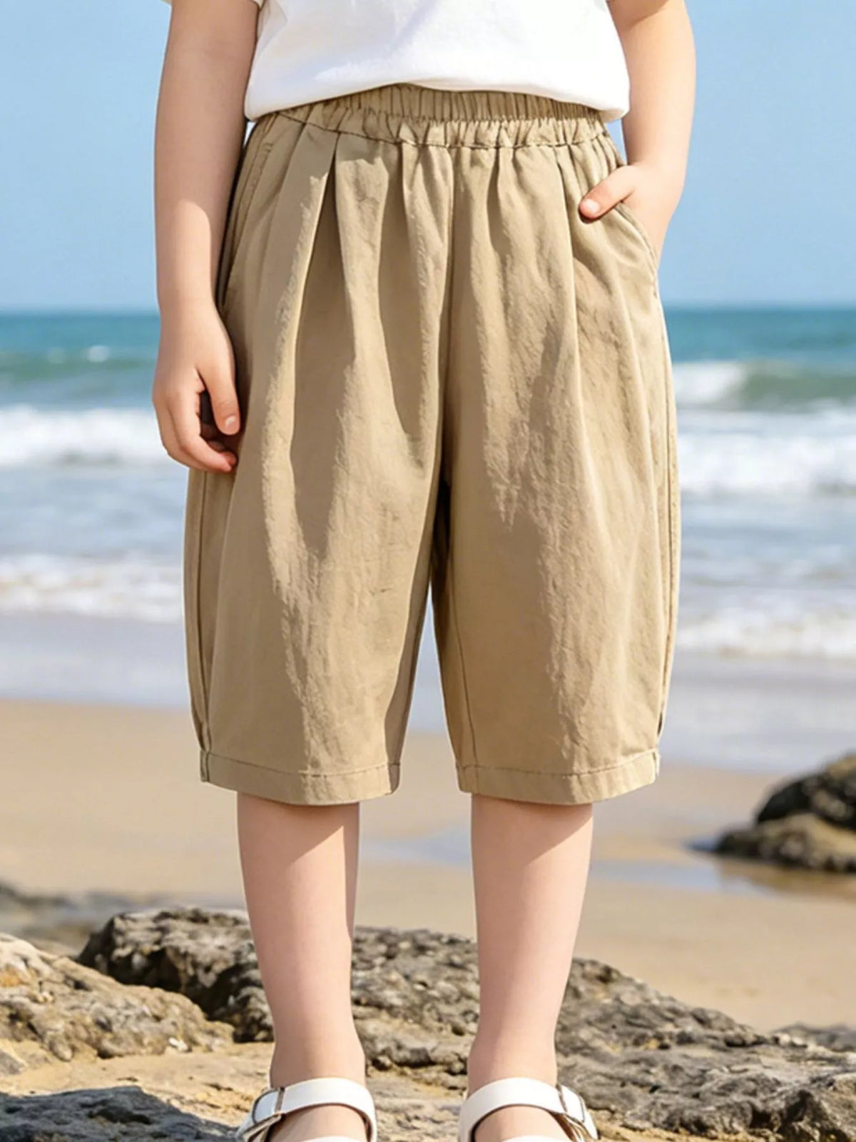Camel elastic-waist capri pants on a child