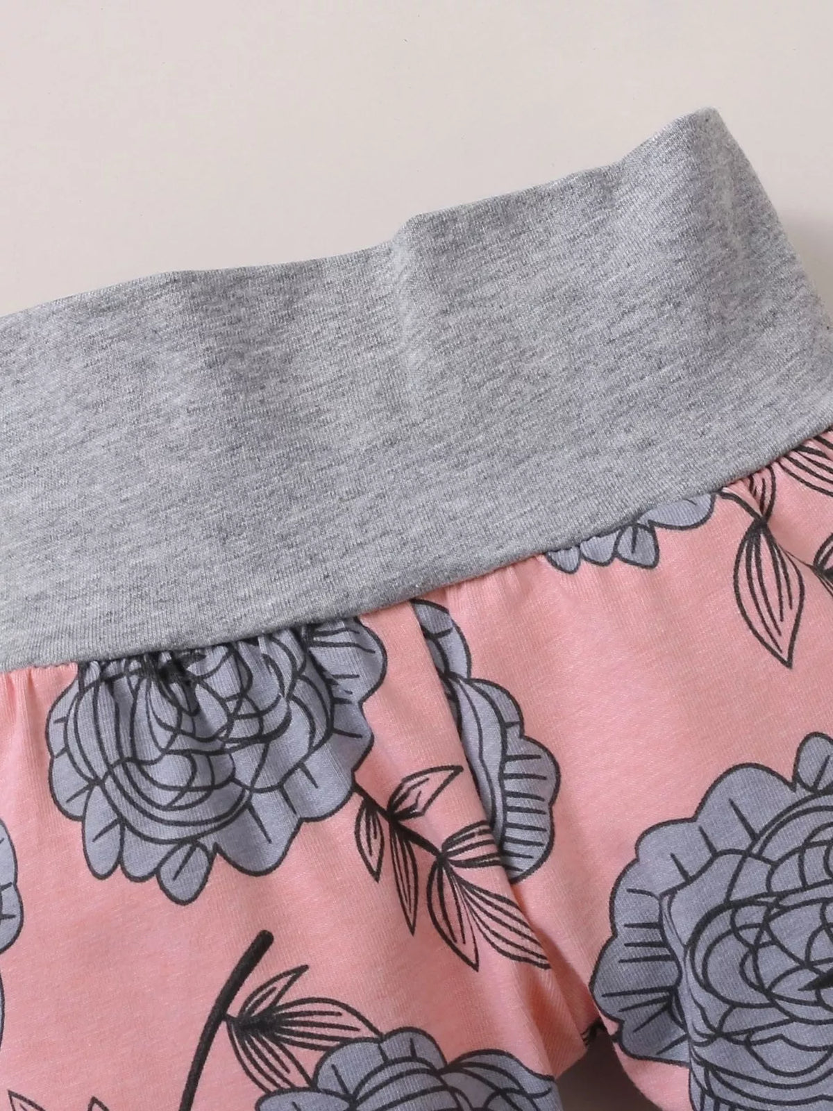 Baby Letter Bodysuit and Floral Pants Four-Piece Set — floral pants waistband detail