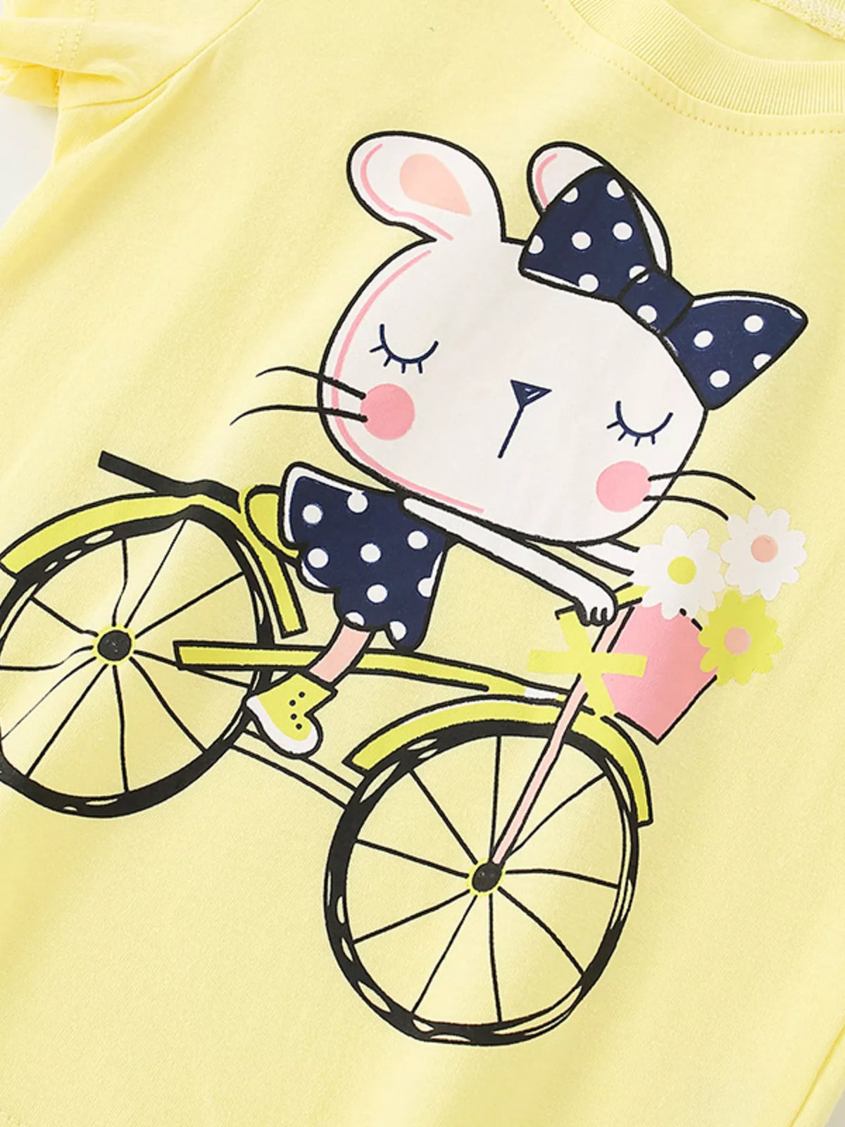 Yellow bicycle bunny graphic shirt — bunny riding a bicycle graphic