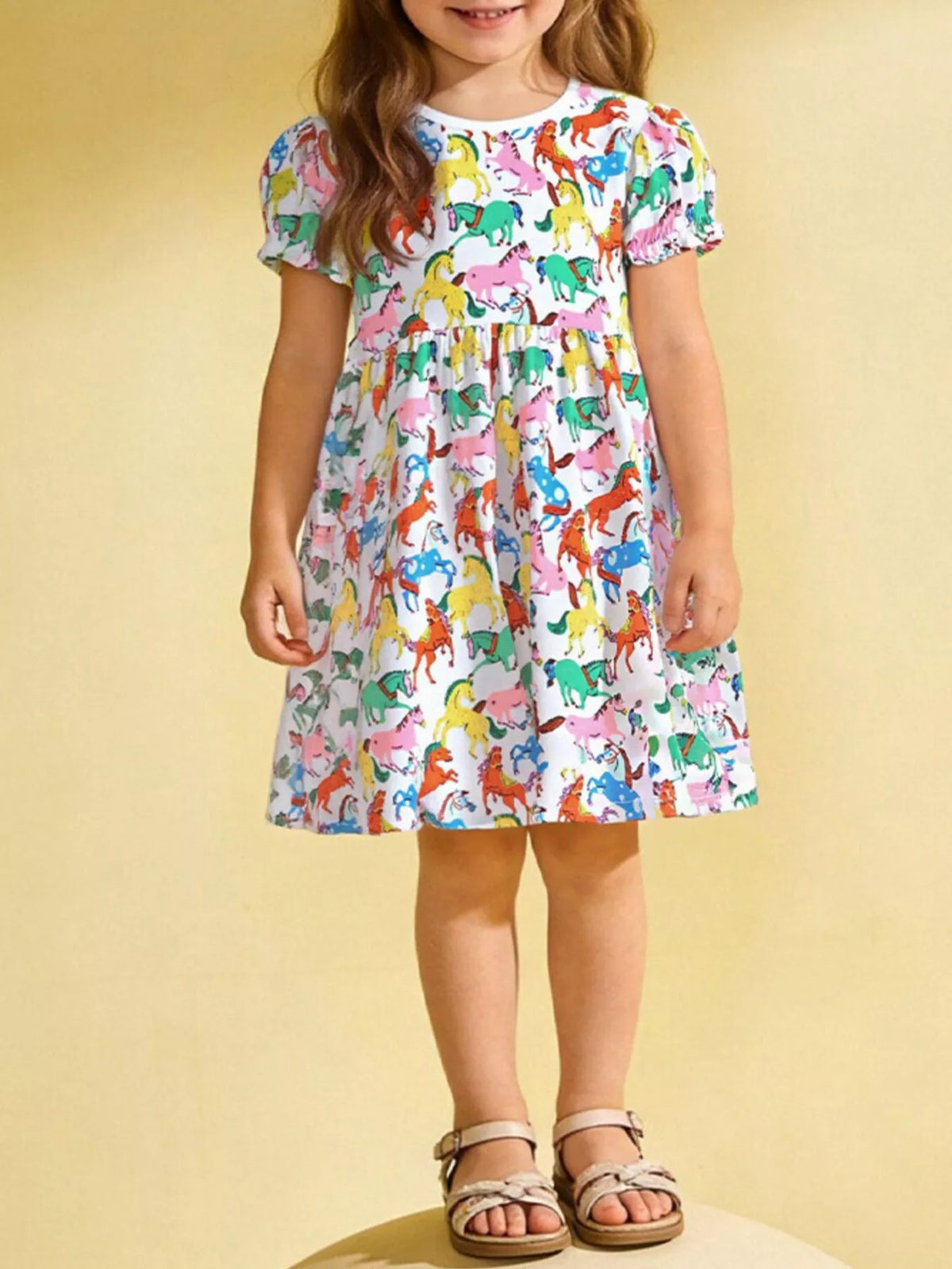 Colorful Pony Print Cotton Dress — dress worn by a child