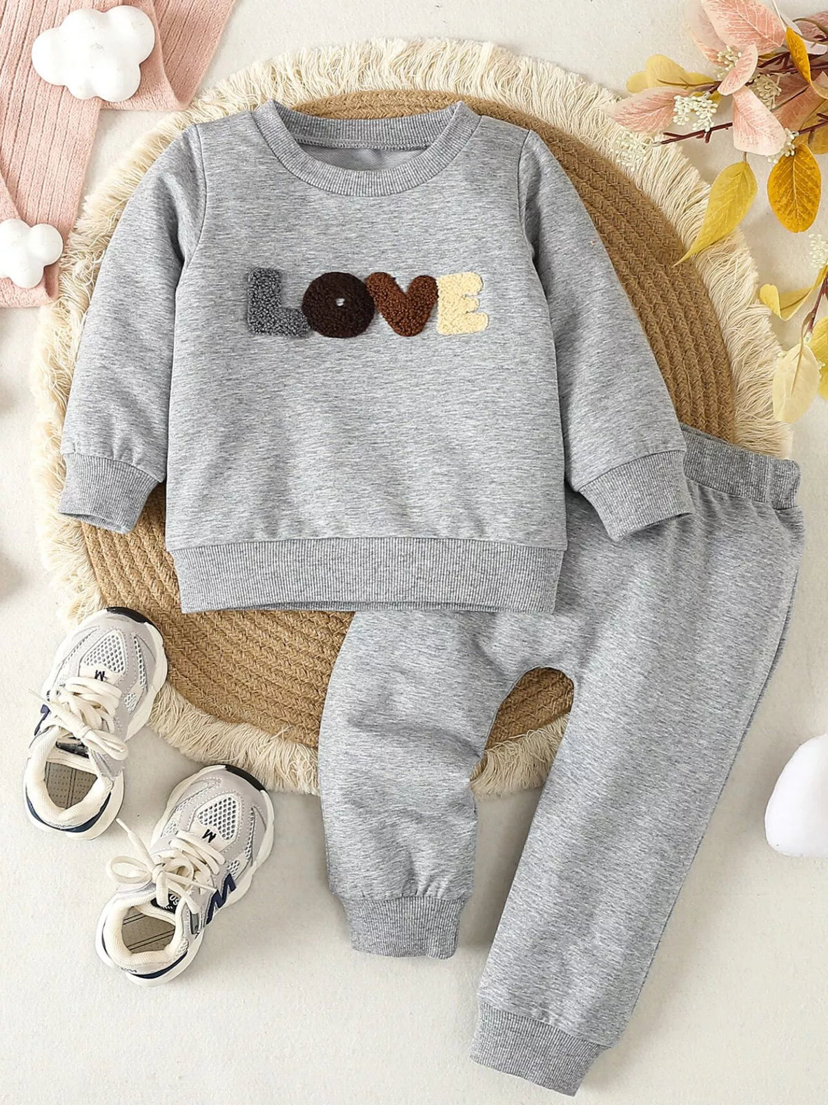 Gray Love top and pants laid flat