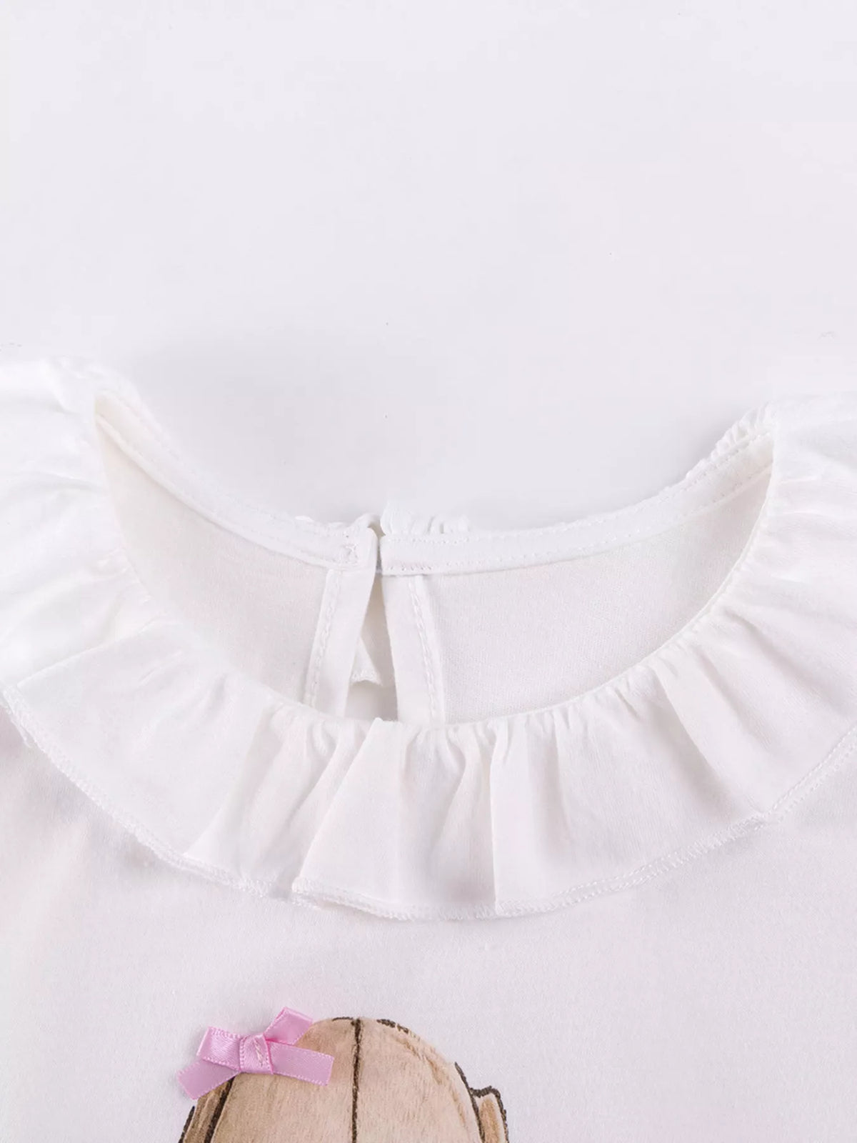 Ruffled white neckline and back keyhole