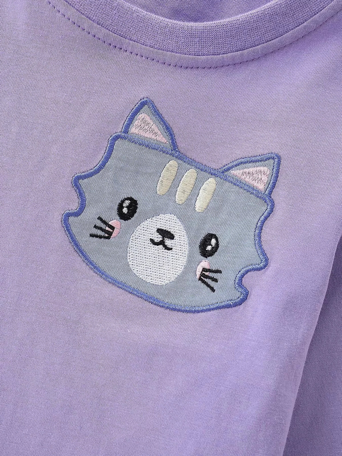Gray cat face graphic on the lavender sweatshirt