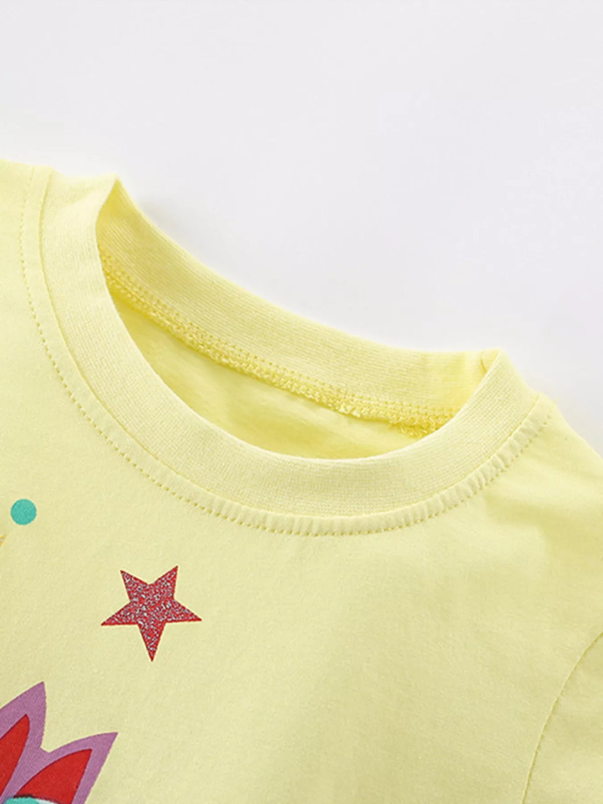 Yellow unicorn graphic ruffle sleeve shirt — round neckline