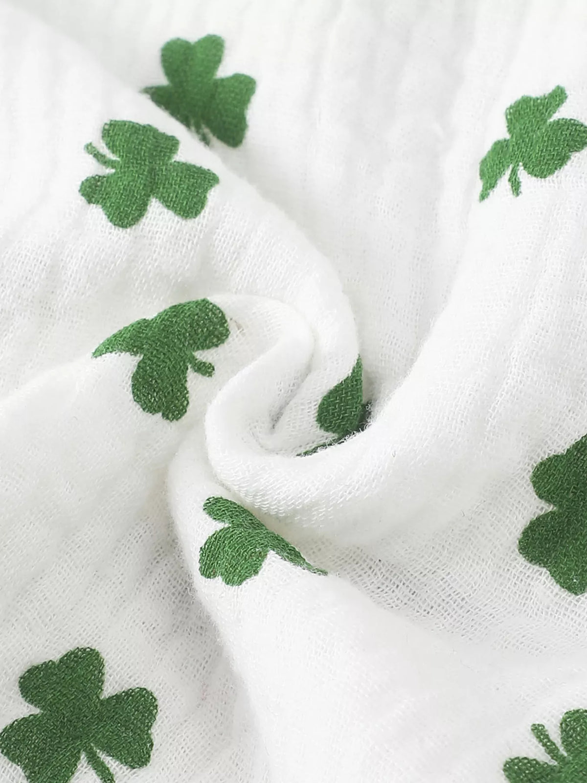 White shamrock ruffle top and flared pants with headband — shamrock printed fabric
