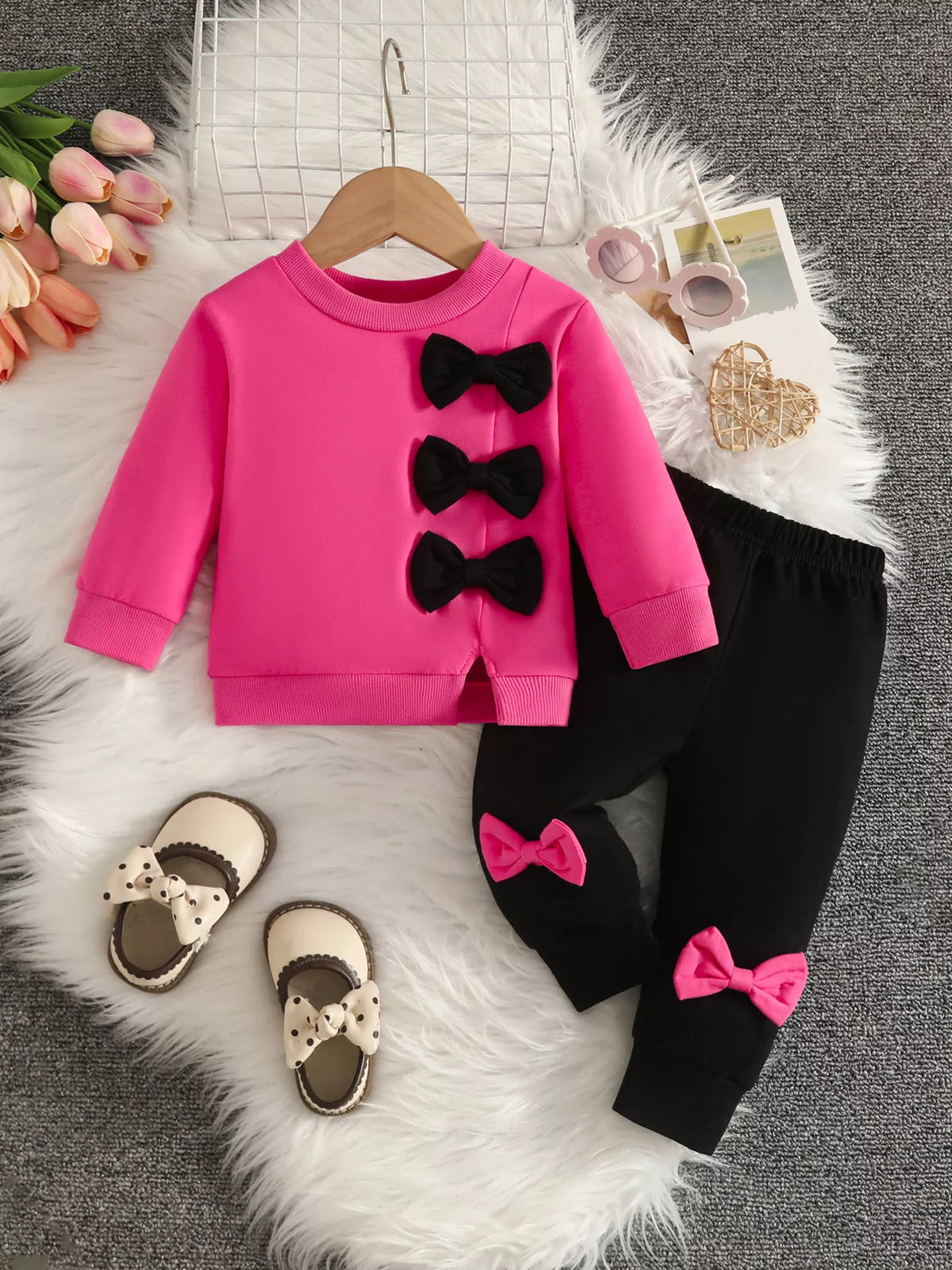 Bow embellished sweatshirt and black pants set — fuchsia outfit front