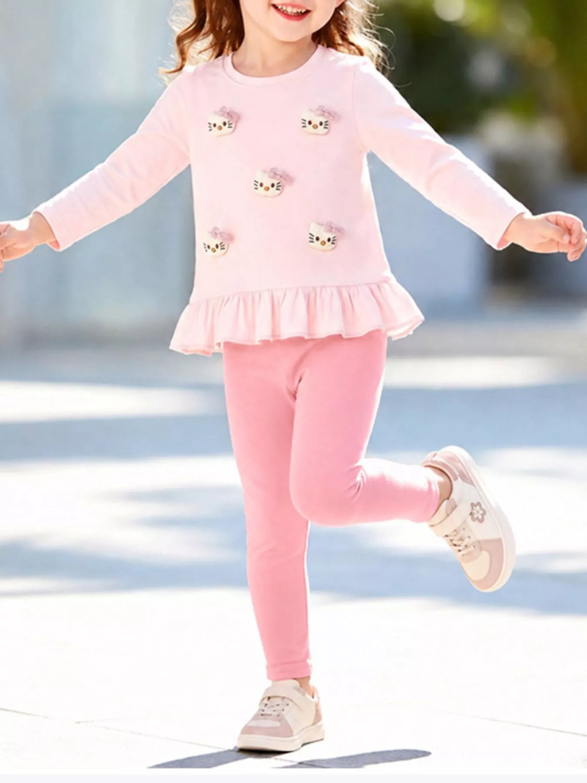 Outfit on a child balancing on one leg