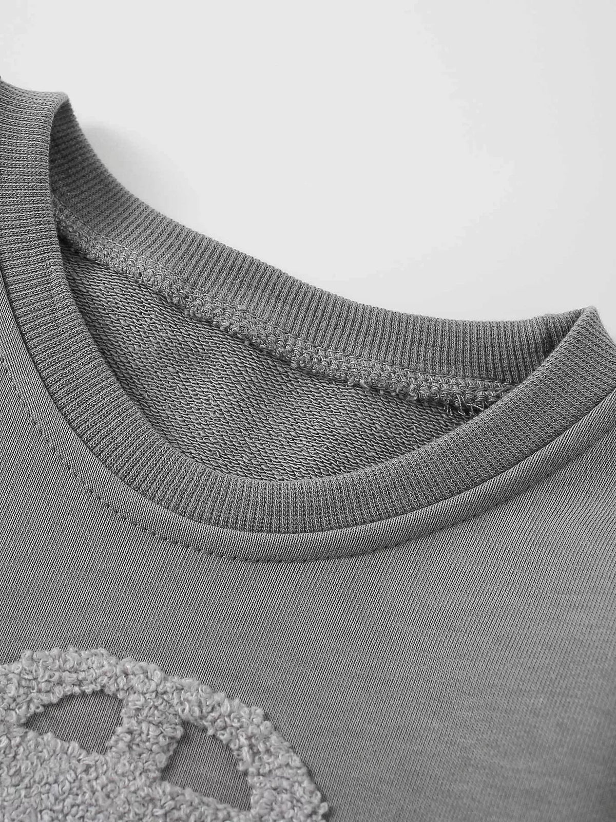Gray ribbed crew neckline