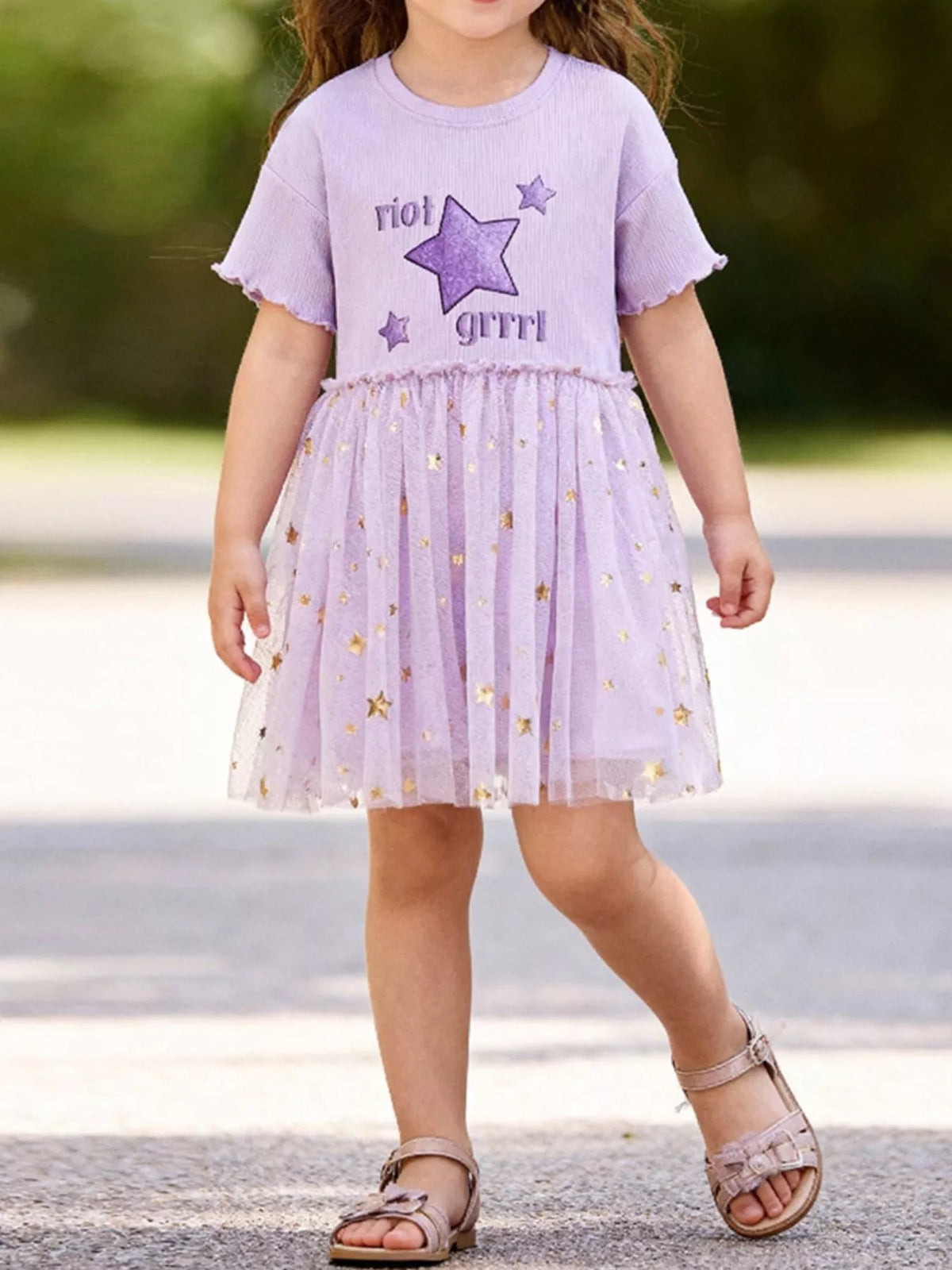 Lavender star dress with a gold-star tulle skirt on a child