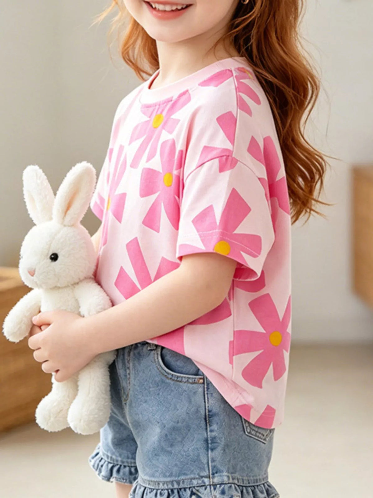 Pink bold flower print shirt — shirt shown on child