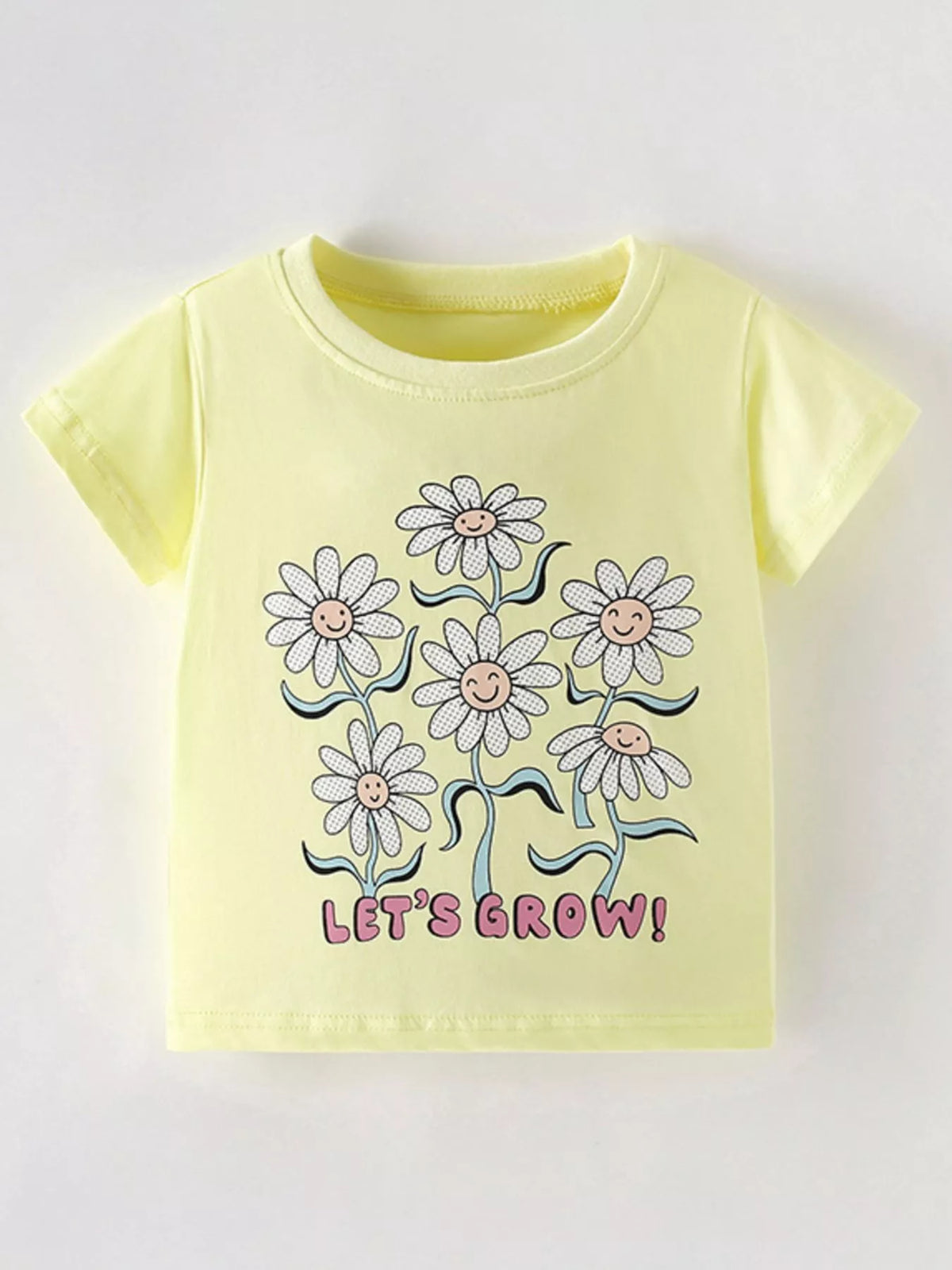 Yellow daisy graphic shirt — front