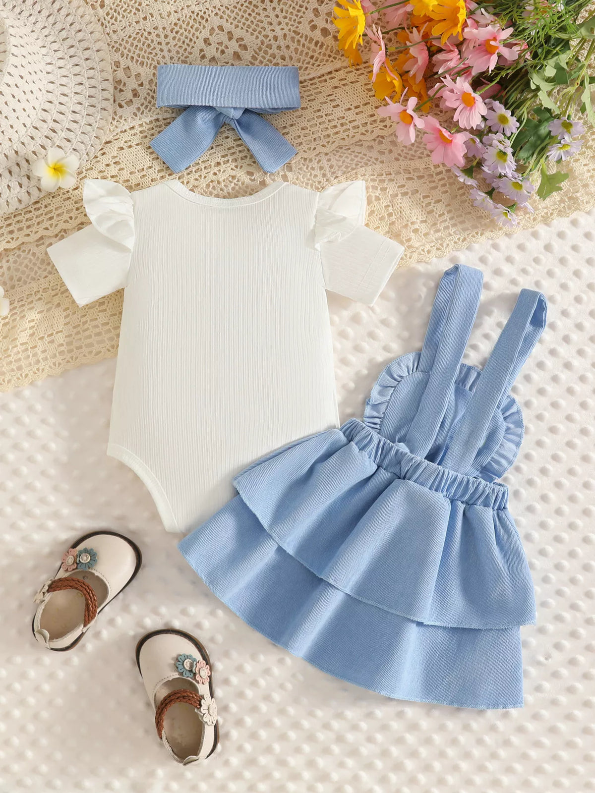 Ribbed floral overall dress and white top set with bow headband — blue dress back