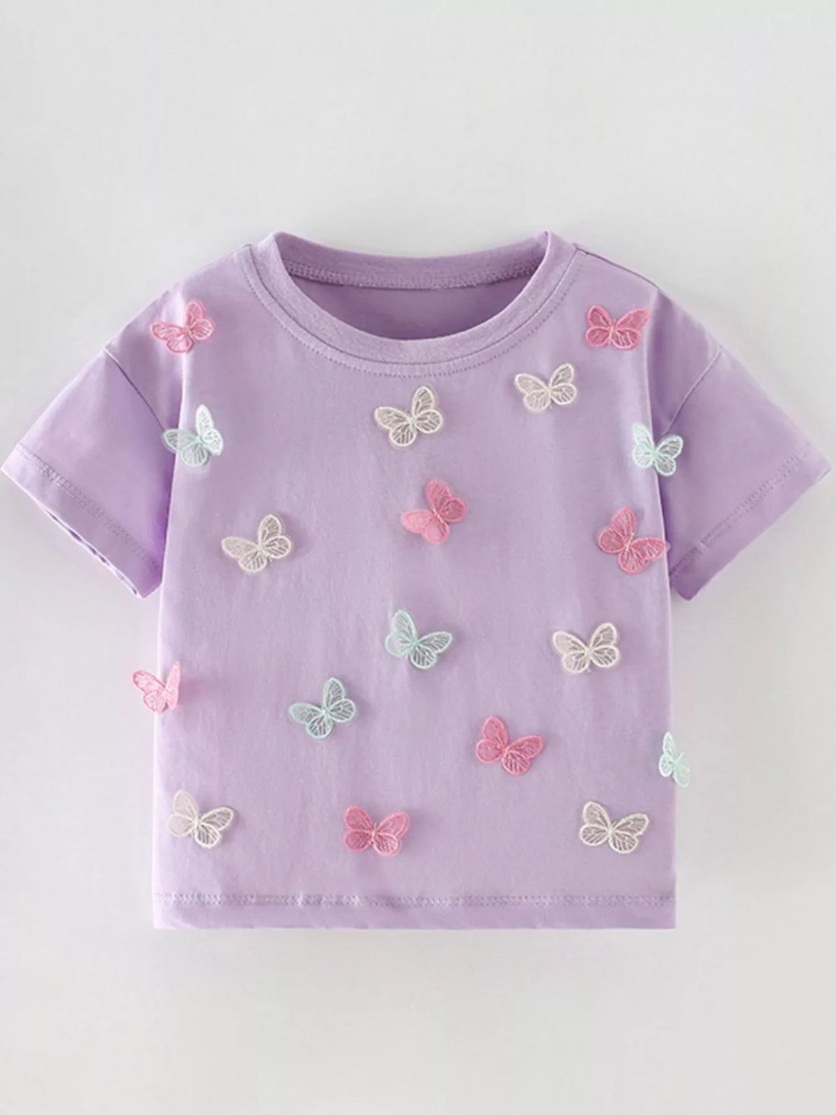 Lavender butterfly applique shirt — front laid flat