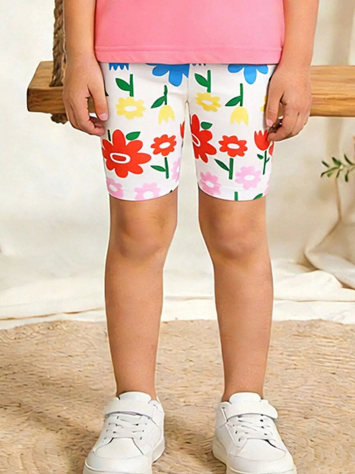 Colorful Floral Print Cotton Shorts — shorts worn by a child