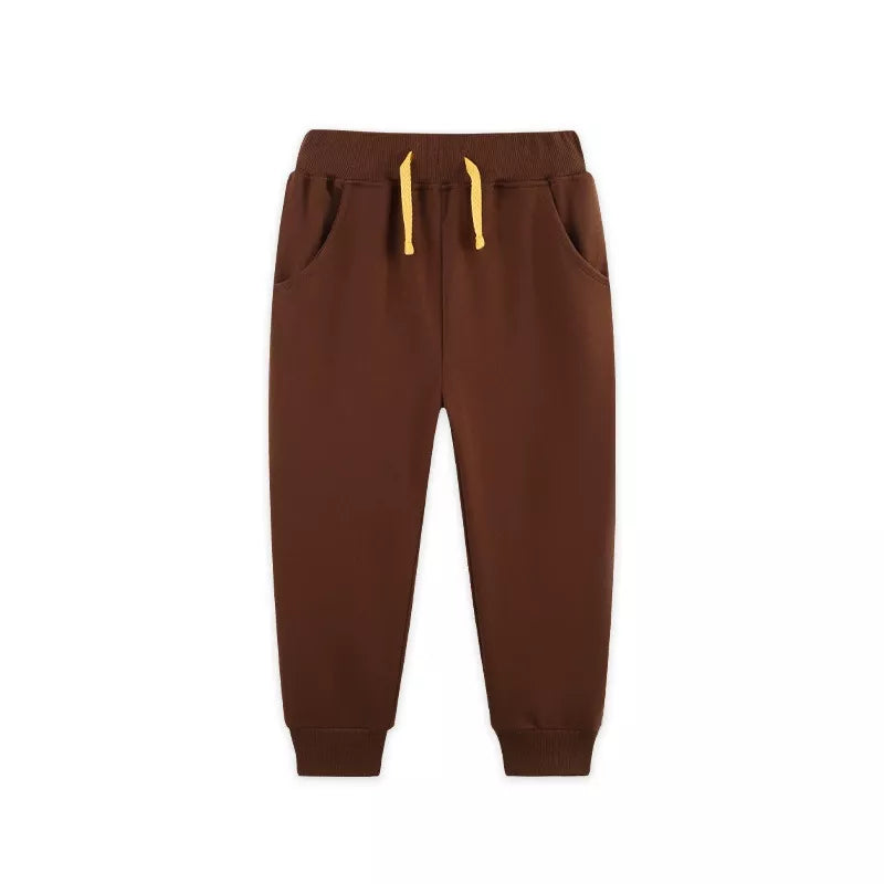 Brown drawstring joggers laid flat