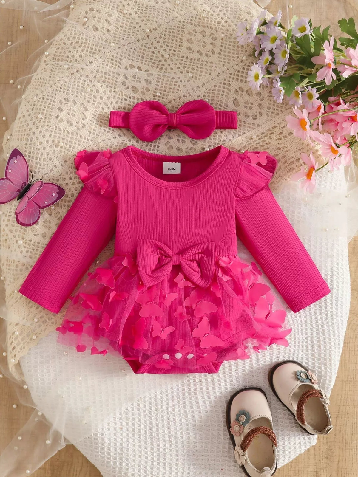 Fuchsia ribbed ruffle bodysuit and bow headband — full outfit front