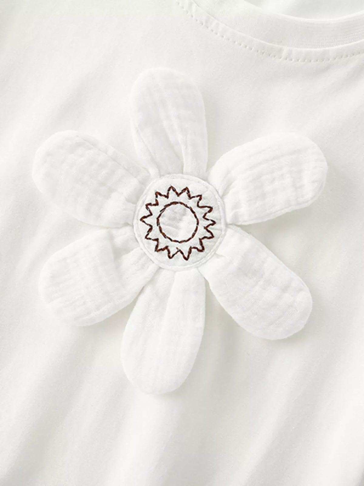 White dimensional flower applique shirt — dimensional white flower