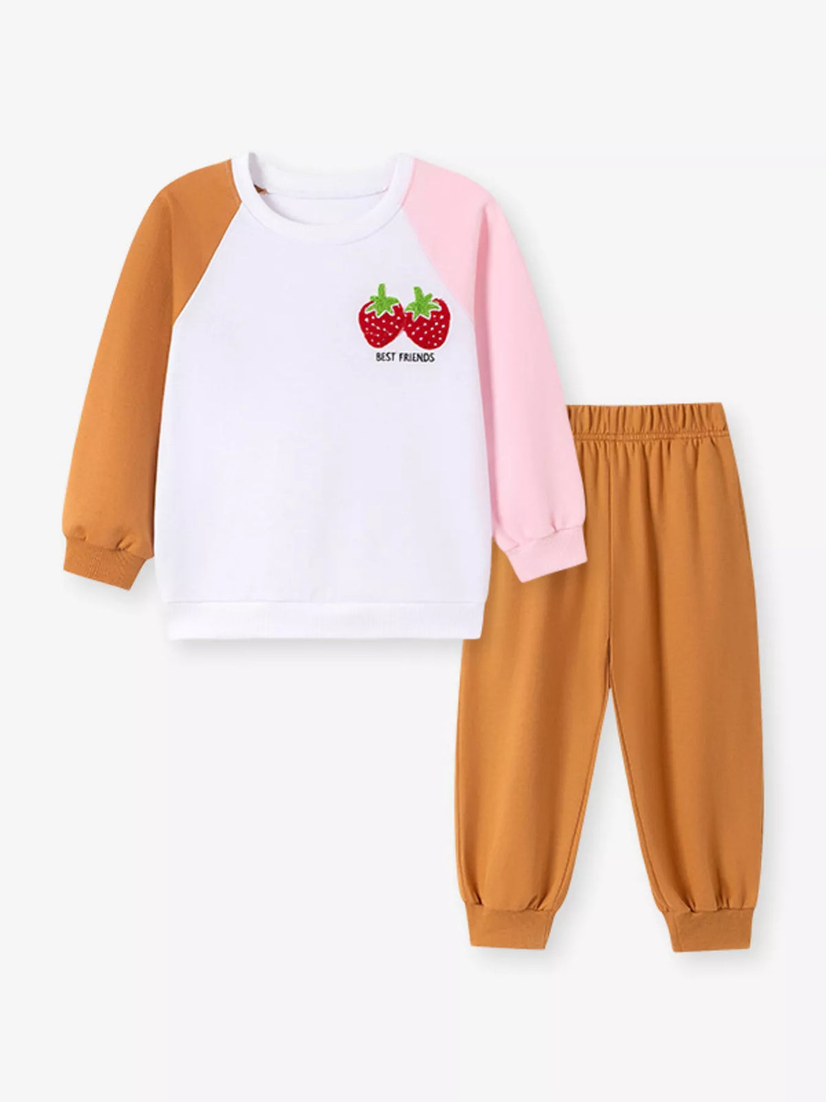 White strawberry sweatshirt with pink and caramel sleeves and caramel pants laid flat