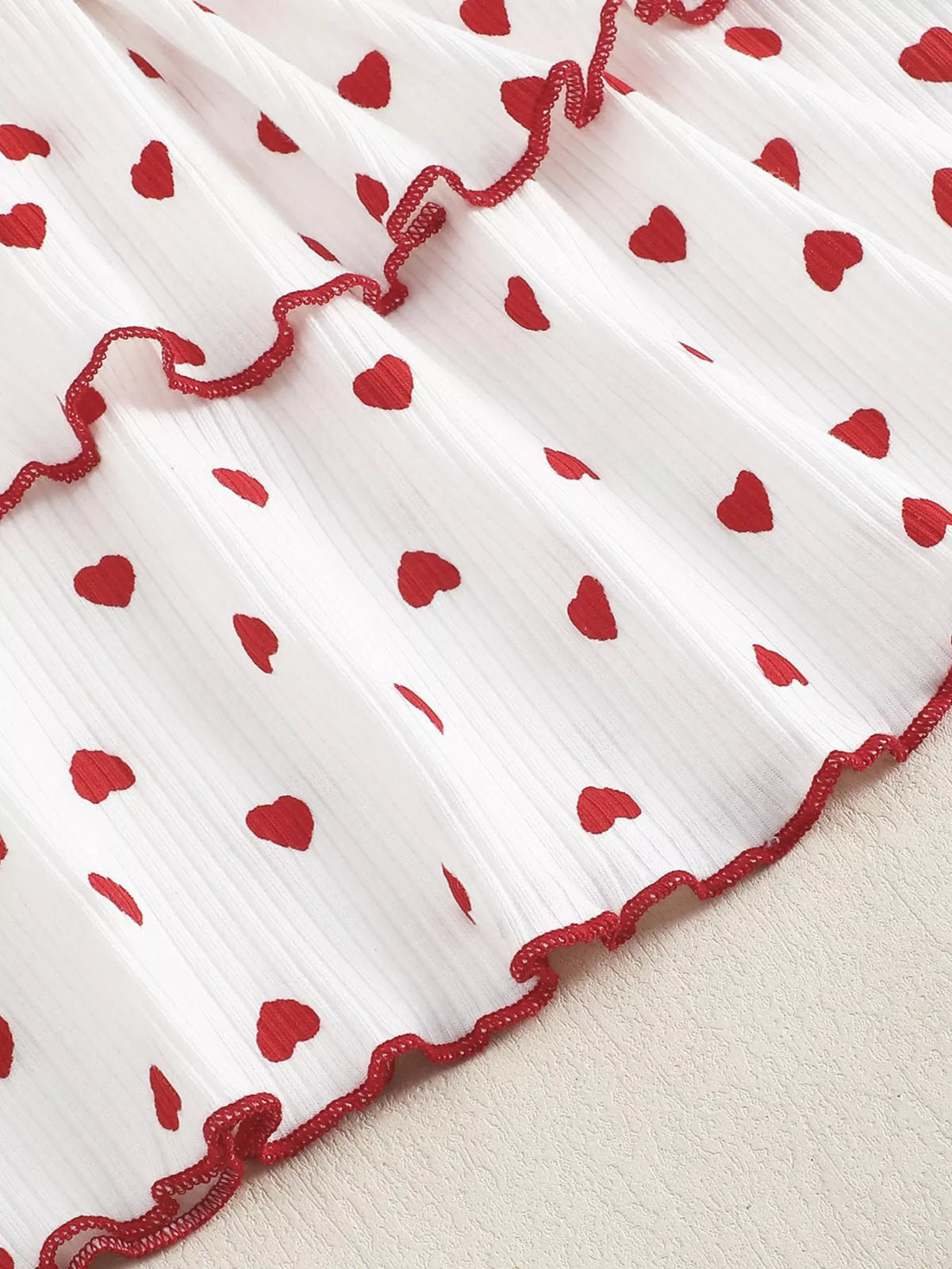 White red heart print tiered dress and bow belt — tiered hem and red trim