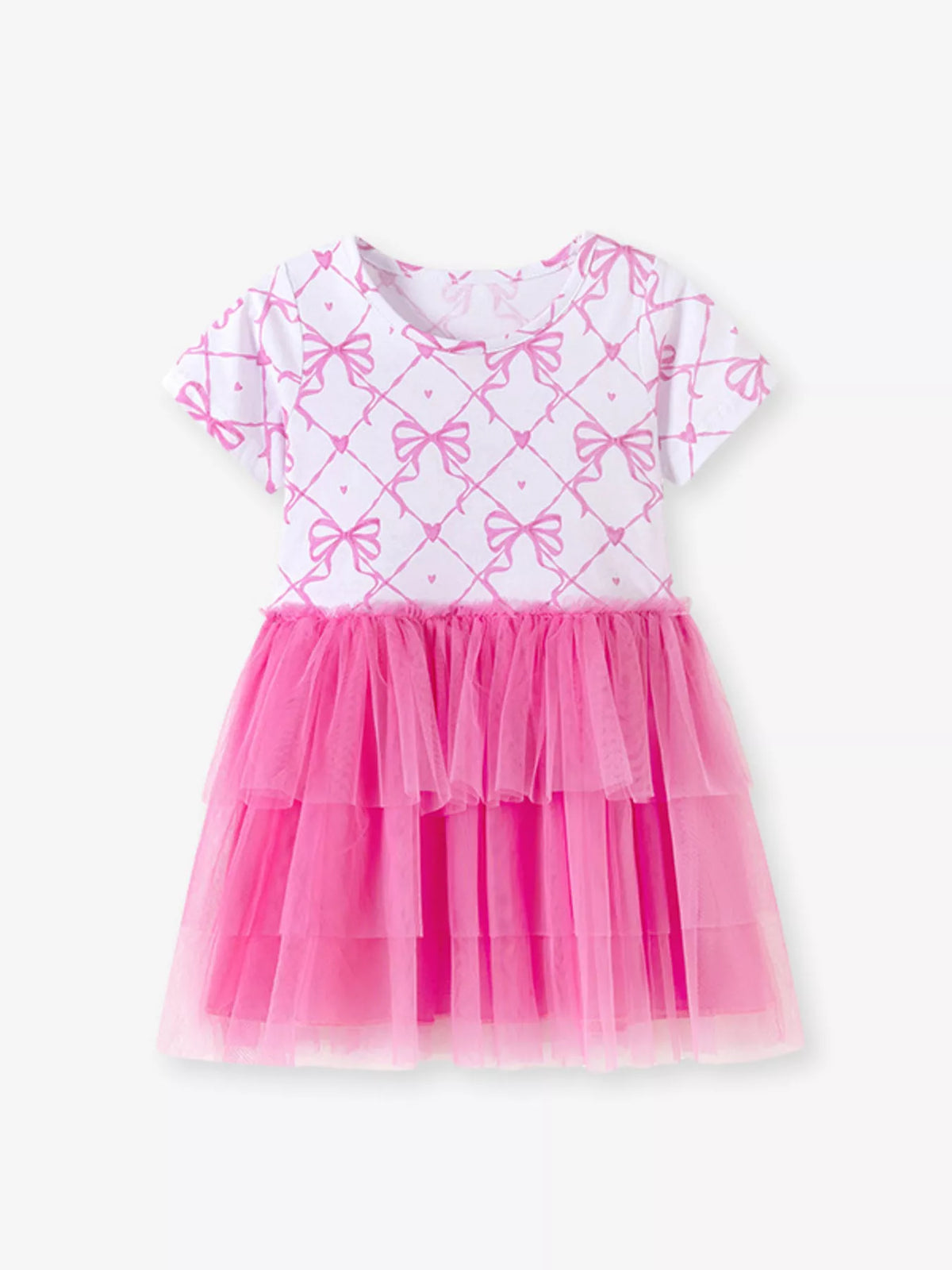 White bow-print dress with a tiered bright pink tulle skirt laid flat