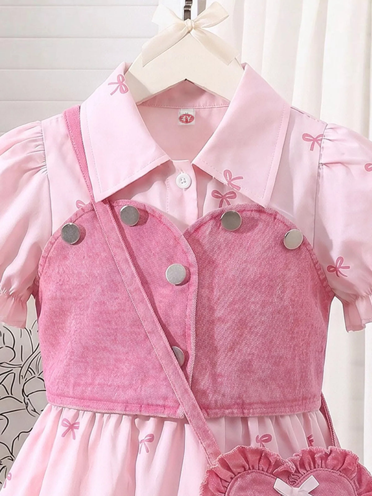 Pink pointed collar and cropped vest button front