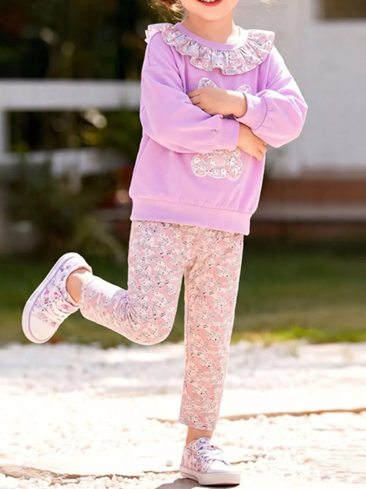 Outfit on a child balancing on one leg