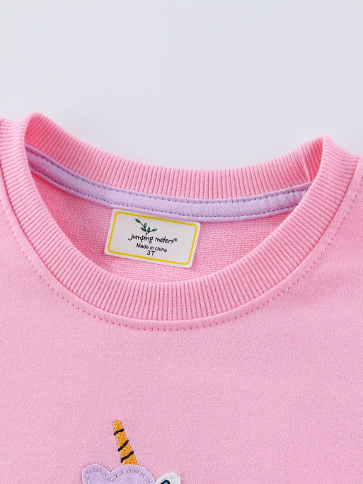 Pink unicorn and flower applique sweatshirt — ribbed round neckline