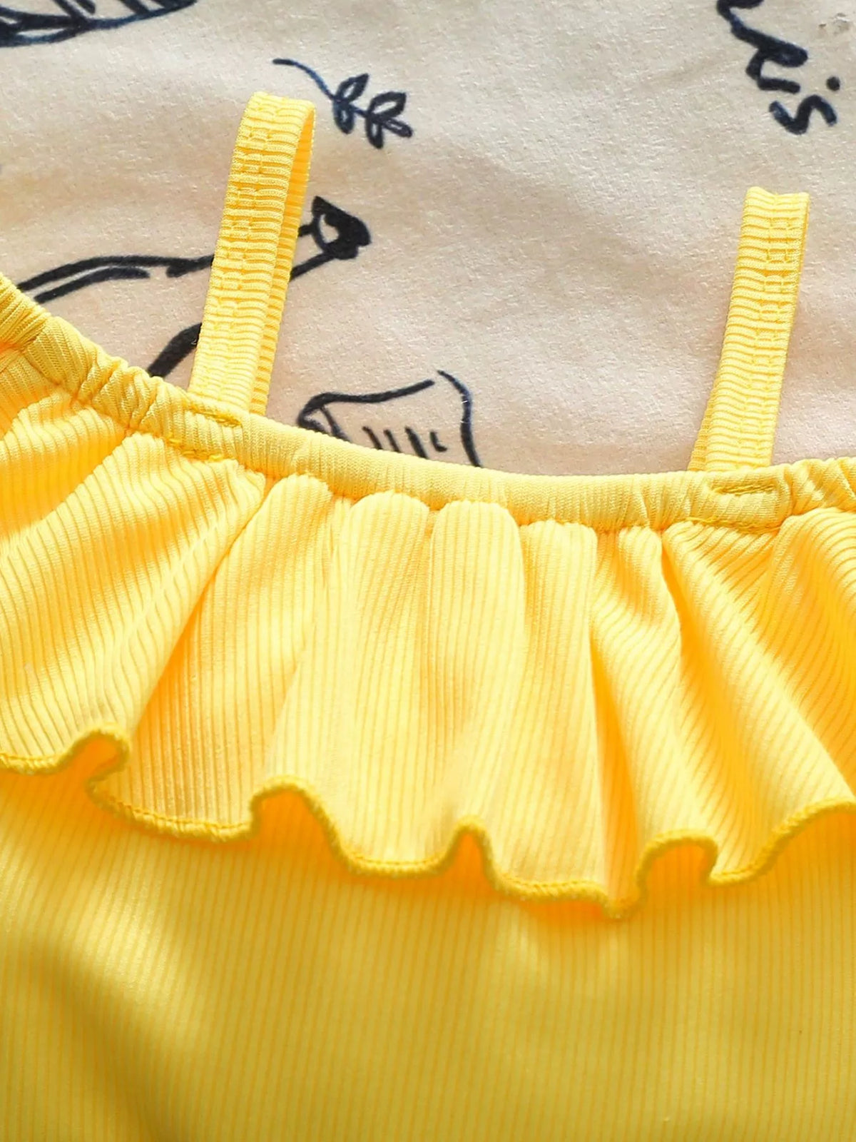 Yellow cold shoulder ruffle top and floral denim skirt — ruffle neckline and shoulder straps