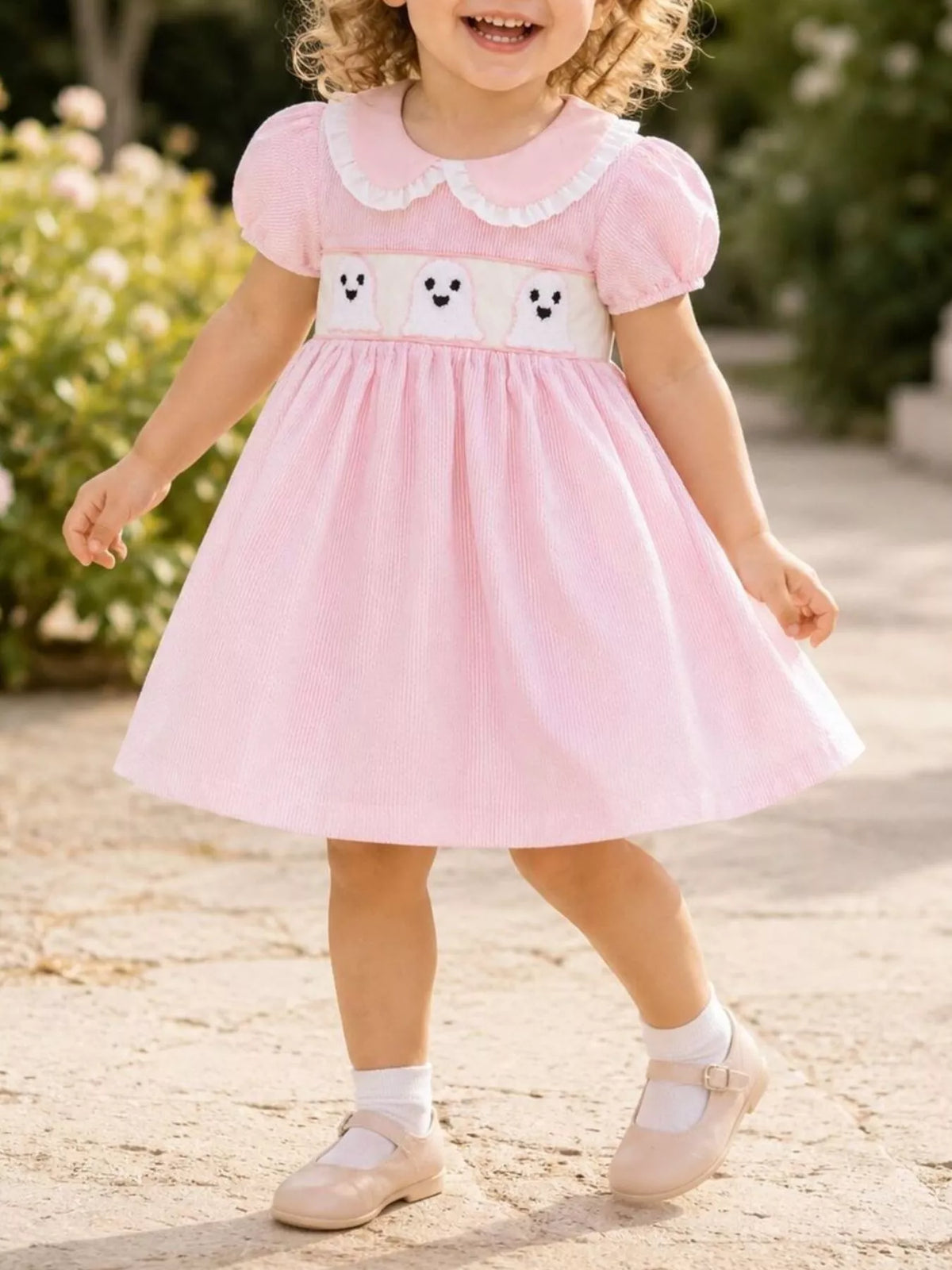 Pink gingham ghost dress on a child