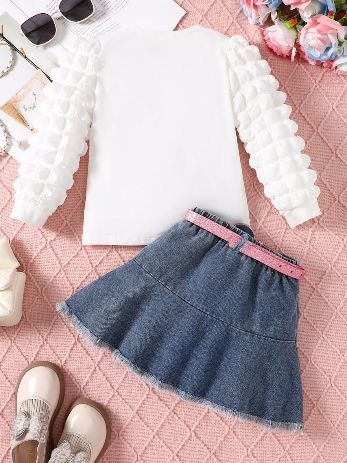 Back of the white top and denim skirt