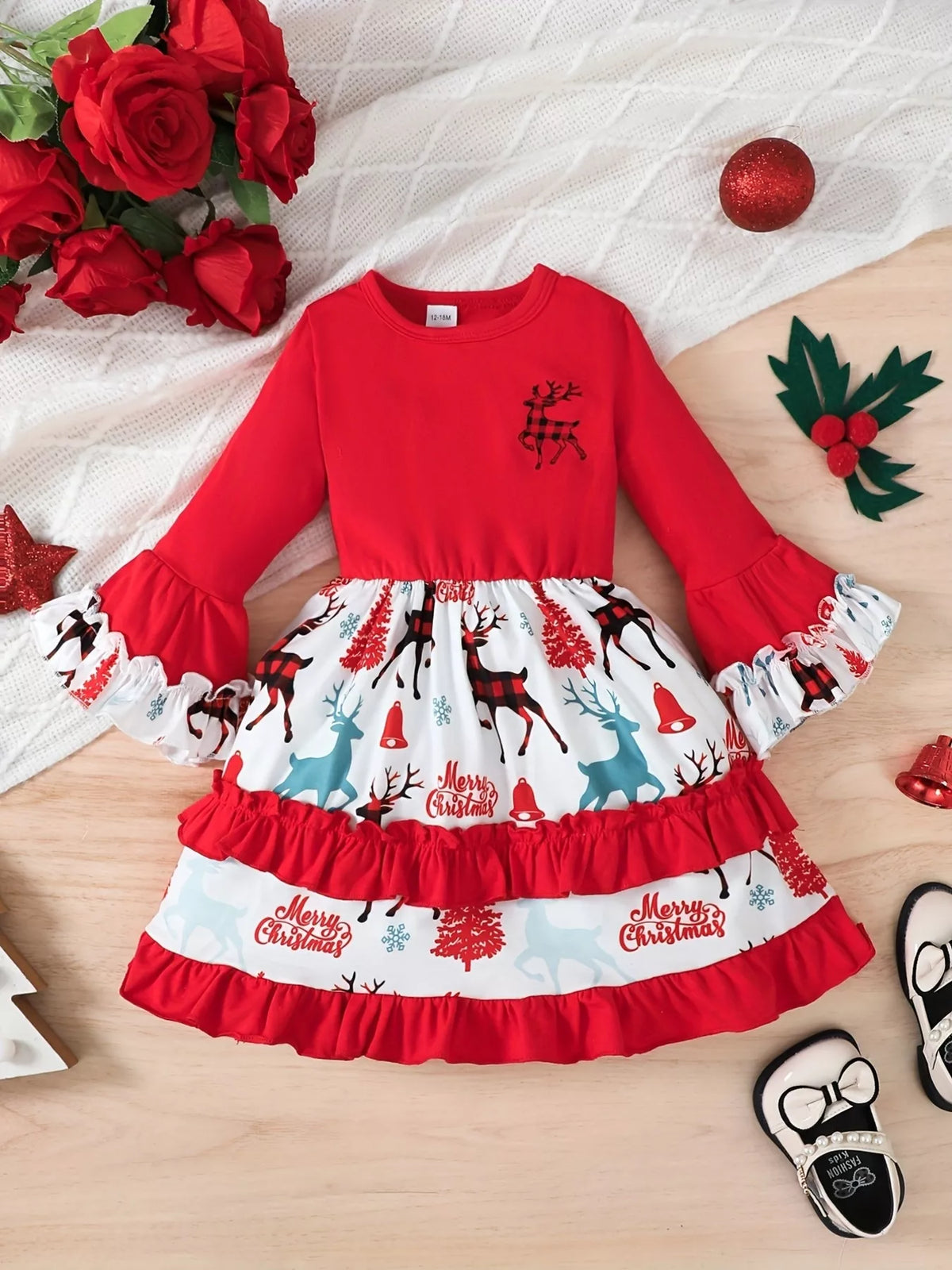 Red Christmas reindeer tiered ruffle dress — dress front laid flat