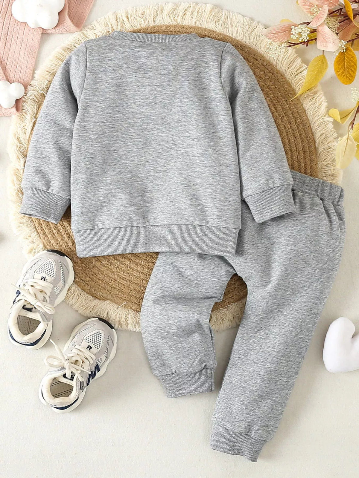 Back of the gray top and pants