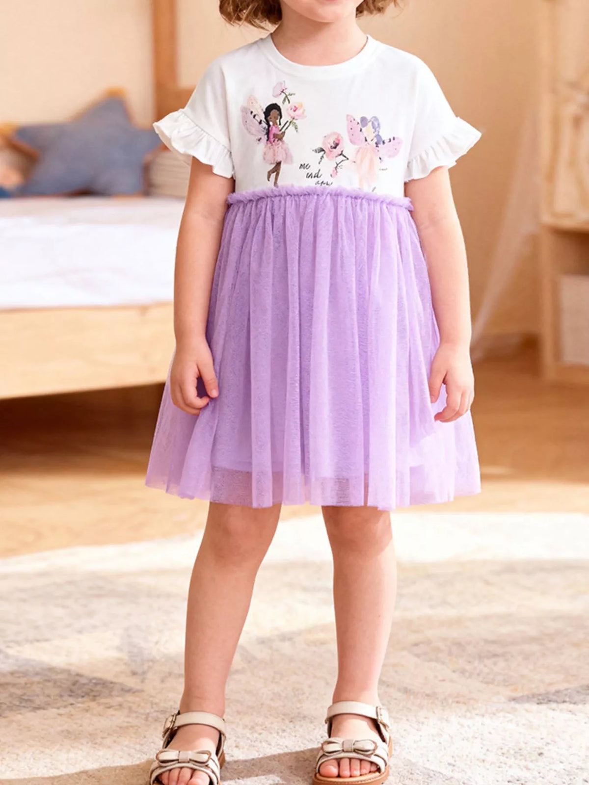 Purple tulle illustrated dress on a child