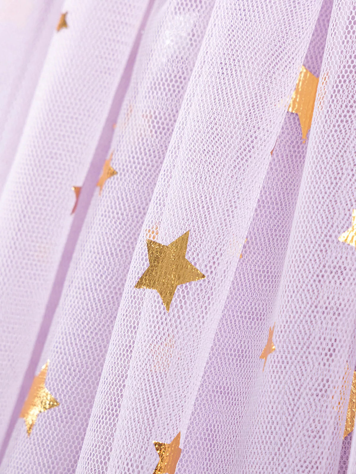 Gold star motifs on lavender tulle