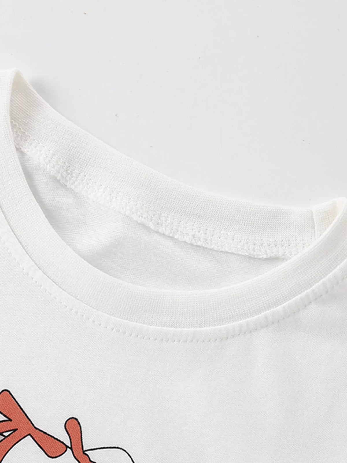 White dressed rabbit graphic shirt — round neckline