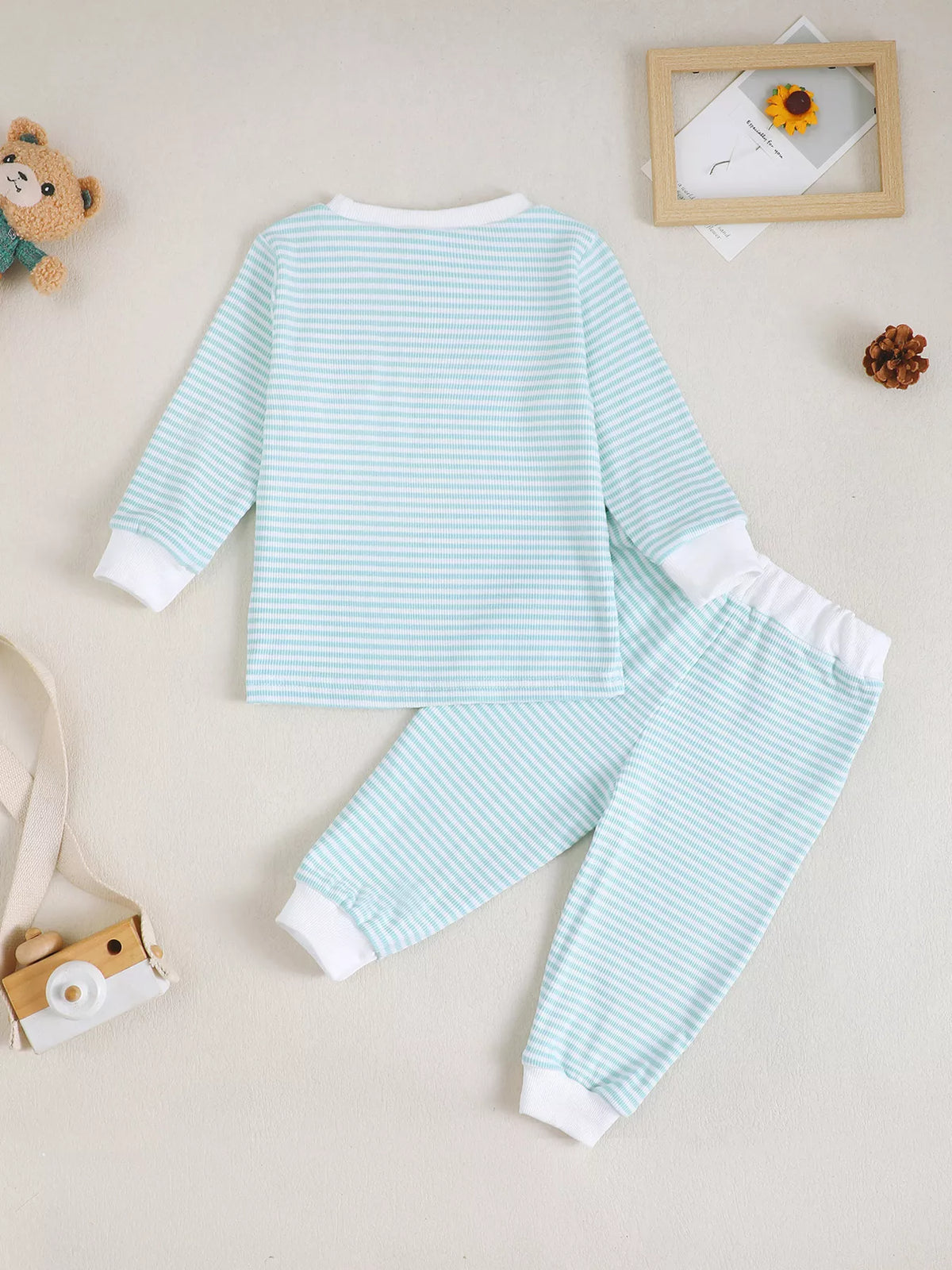 Back of the pale blue striped outfit