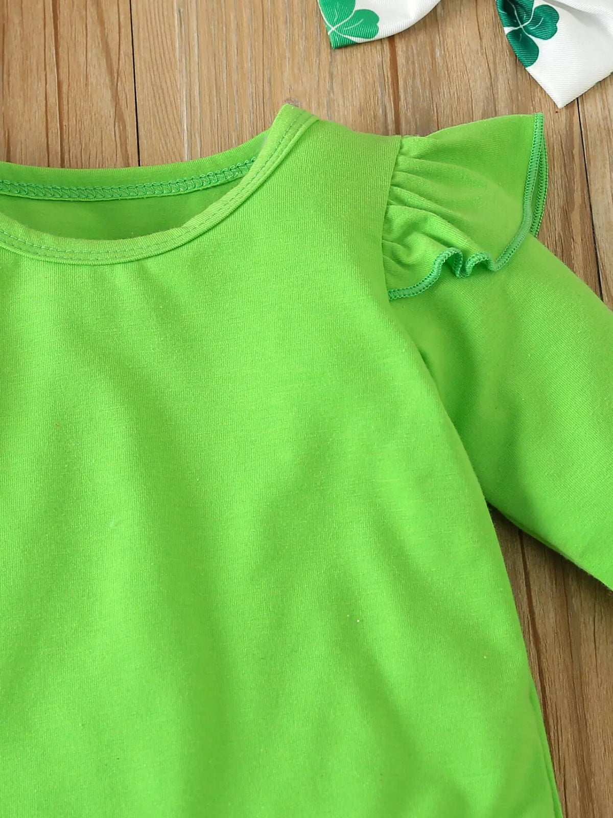 Green round neckline and shoulder ruffles