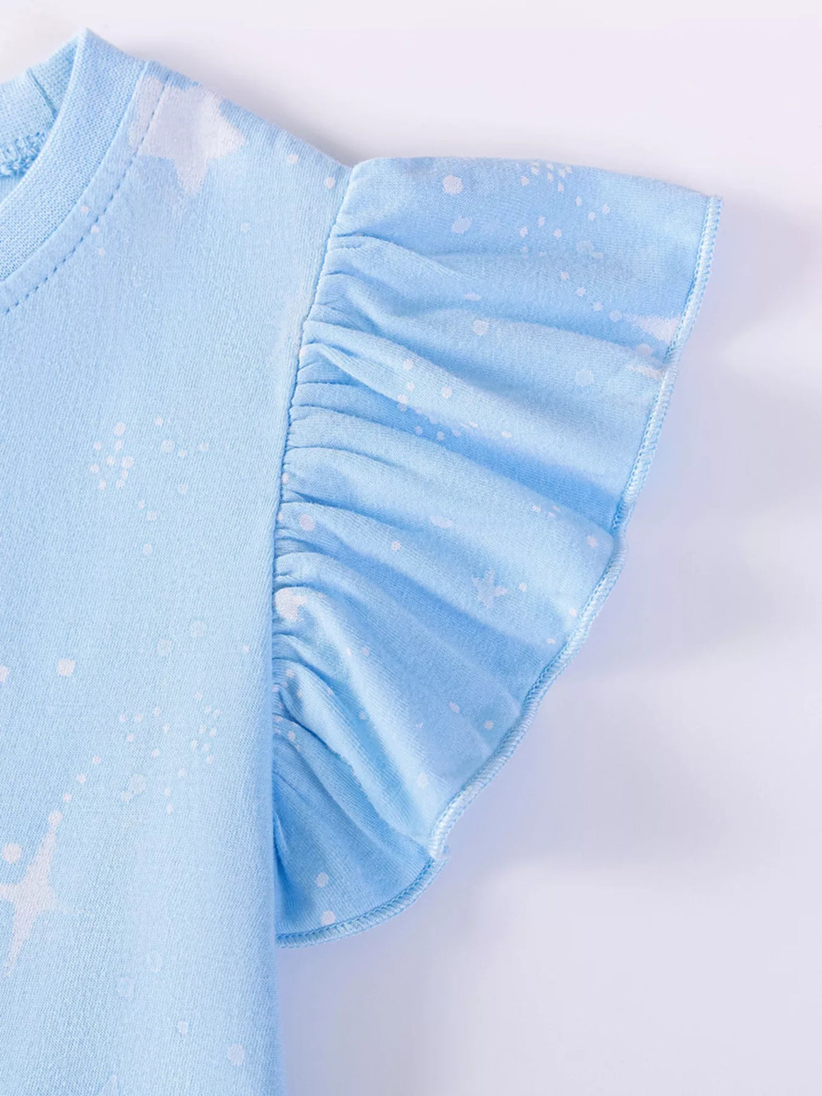 Gathered blue shoulder ruffle