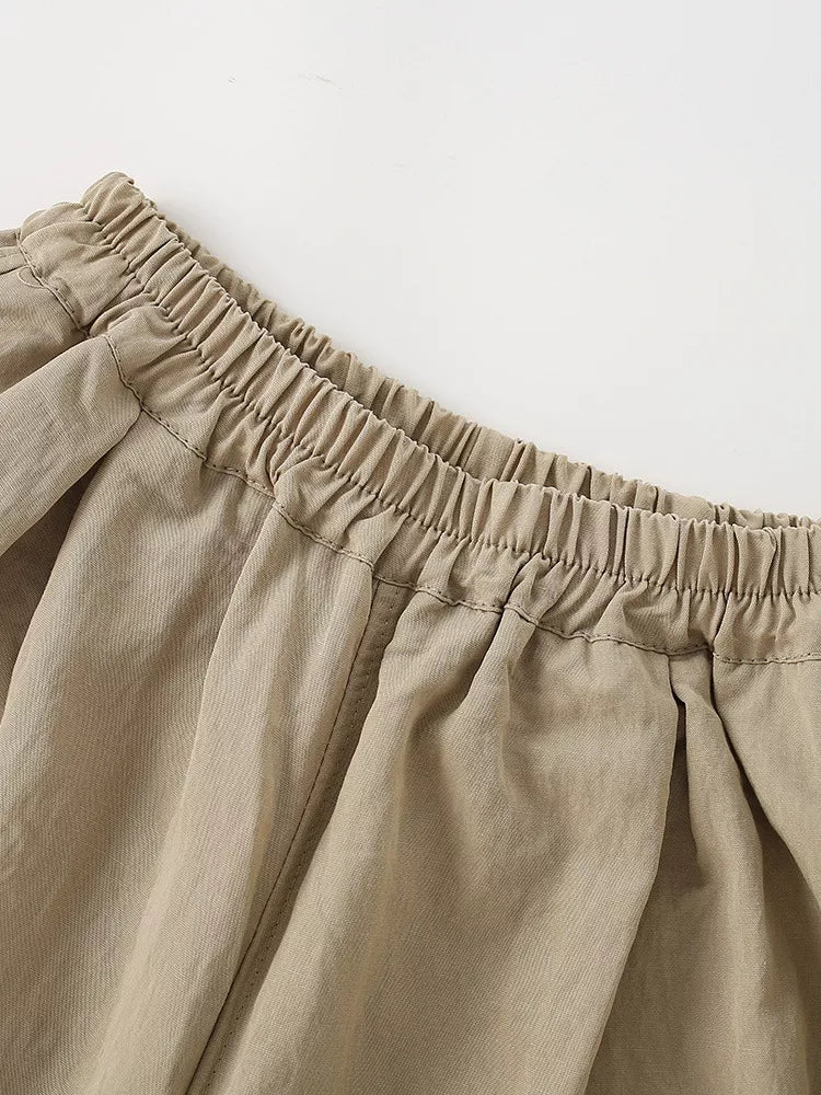 Gathered camel waistband and front pleats