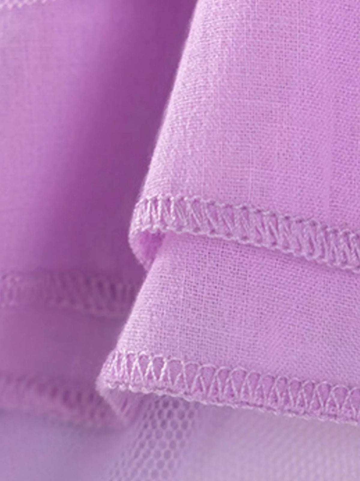 Stitched purple skirt lining hem